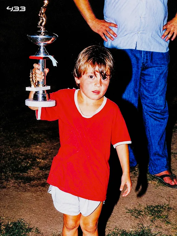 Lionel Messi holding his eighth Ballon d'Or